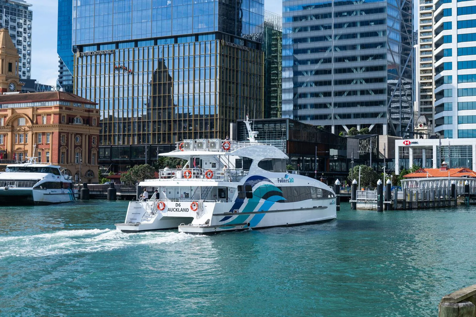 Fullers ferry leaving the downtown Auckland waterfront by the Ferry Building