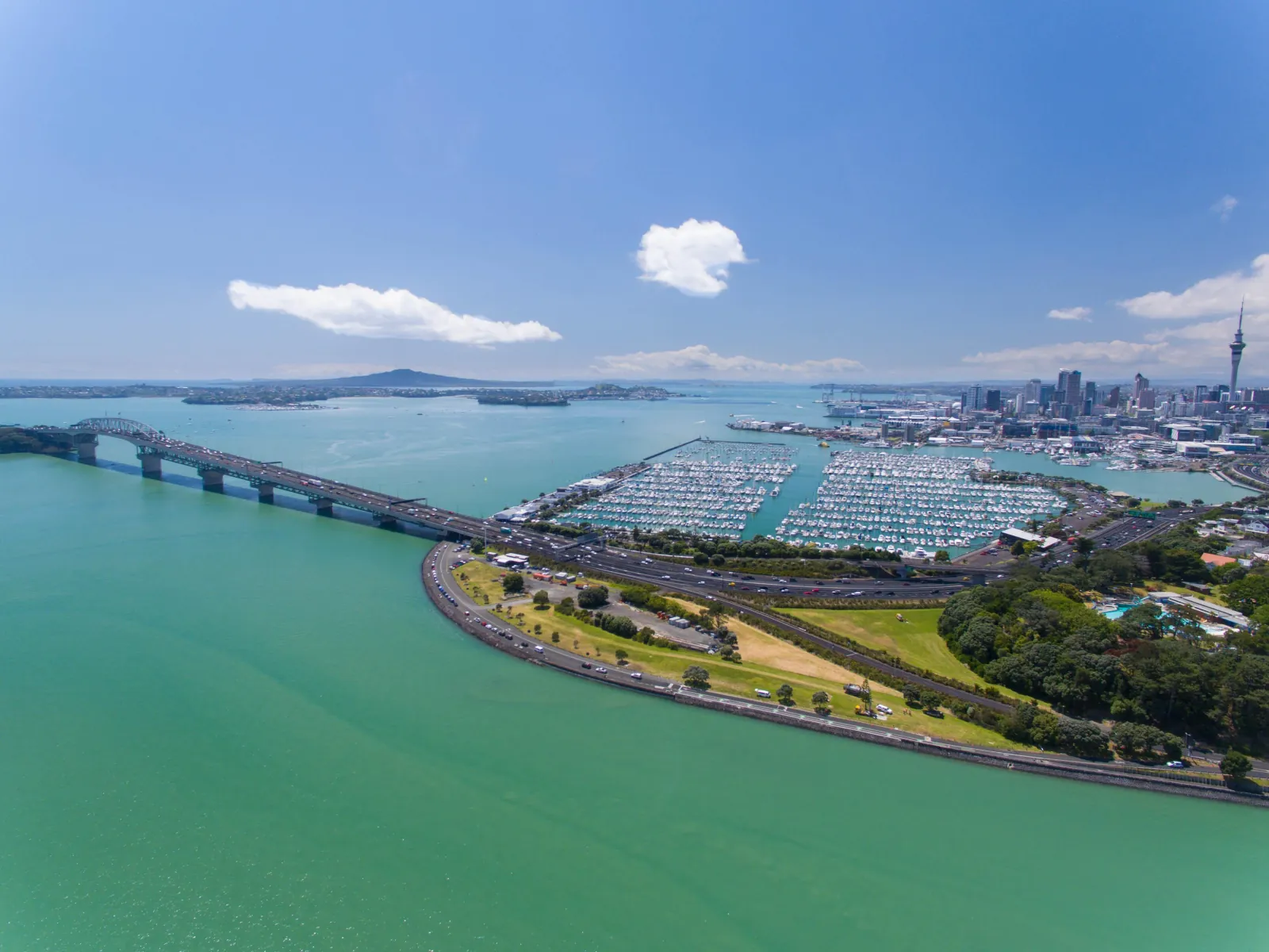 Aerial view of the Harbour Bridge, Westhaven Marina and Rangitoto beyond