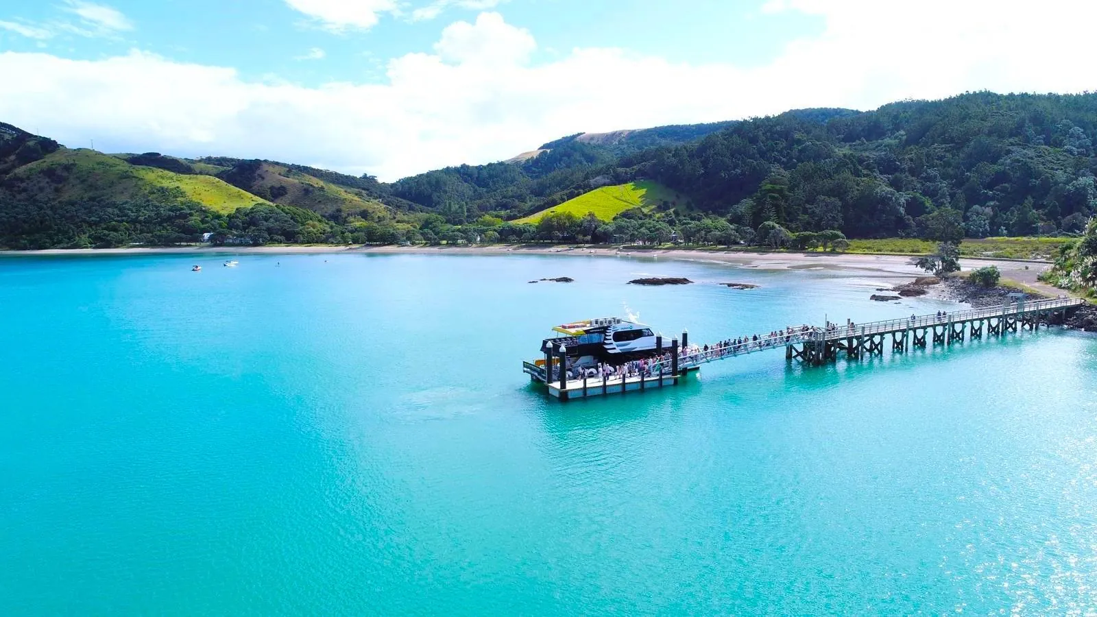 Aerial view of the ferry at the Man O' War Bay jetty on turquoise water